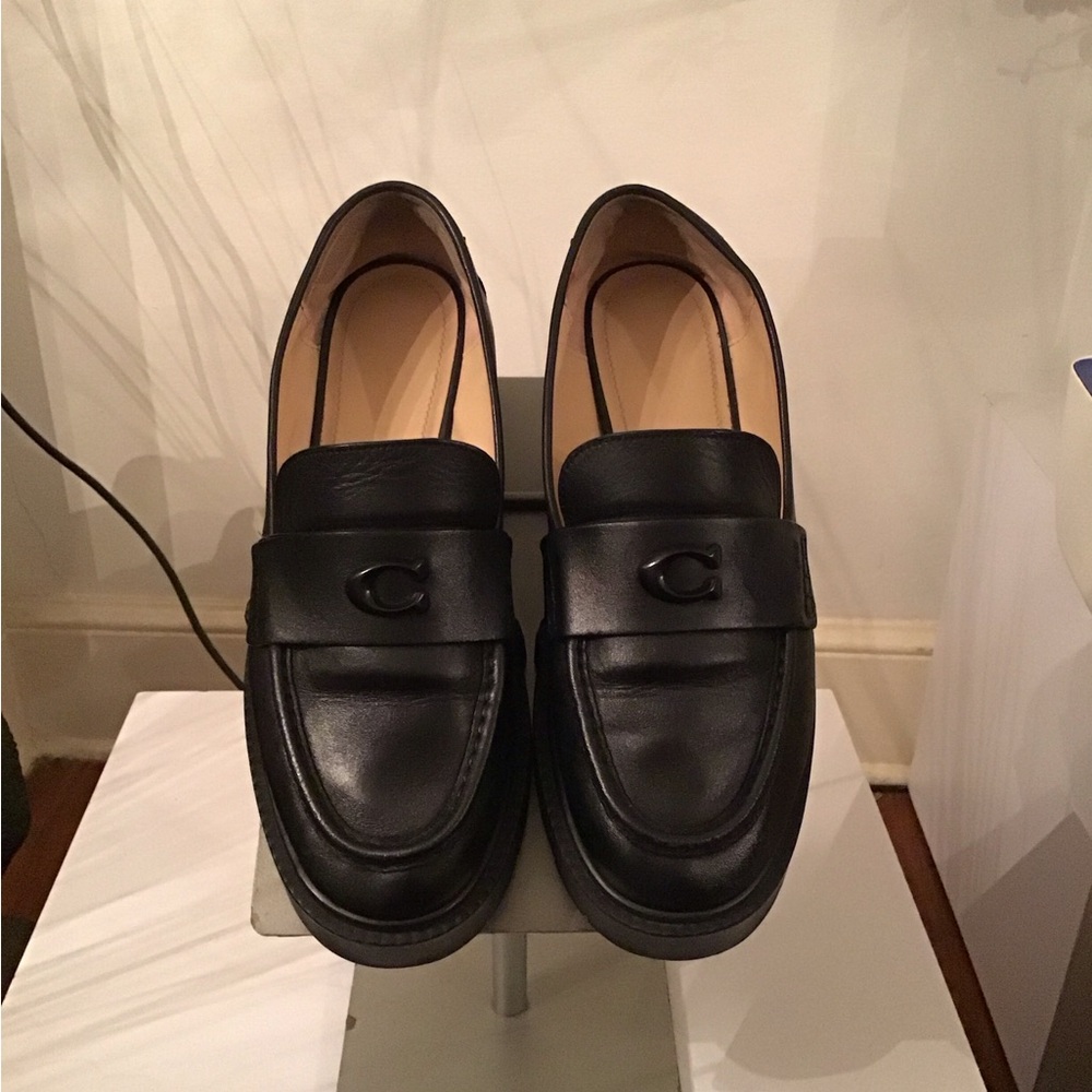 Delicate used Coach leah platform loafer Slip-On back heels show a little wear.
